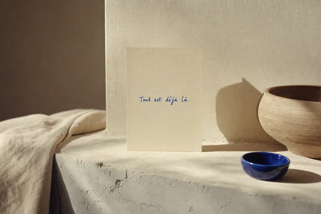 A sentence written across a large sheet, half crossed out and rewritten twice below.